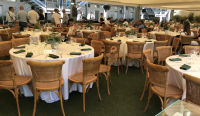A view of the covered dining area of the Garden Lounge hospitality area