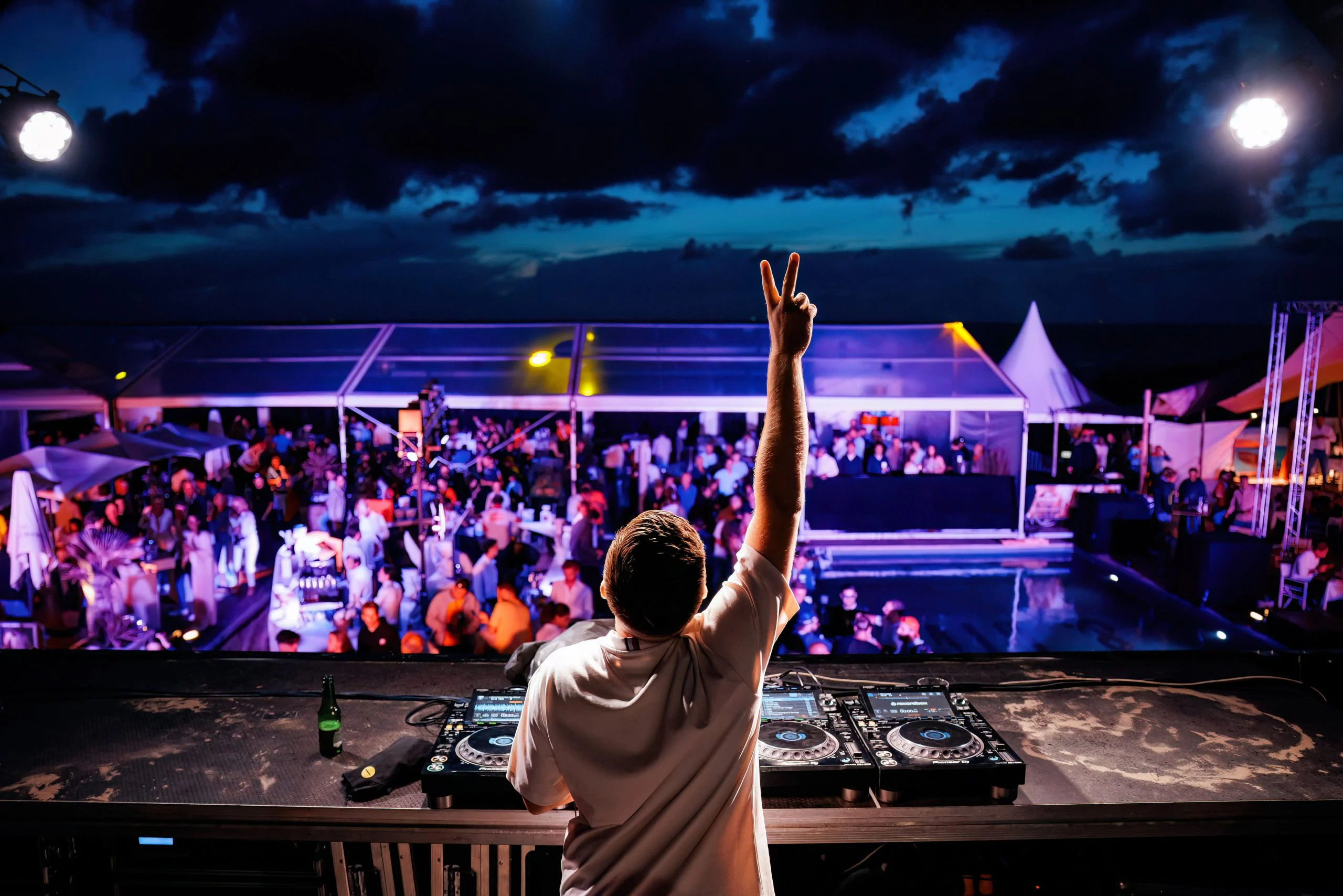 A DJ performs at Bernie's beach club during the Dutch GP after party