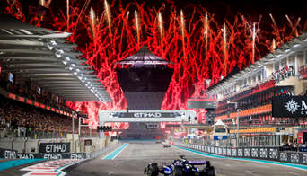 Fireworks going off as the F1 cars come down the Main Straight for the last time