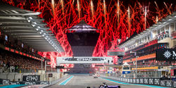 Fireworks going off as the F1 cars come down the Main Straight for the last time