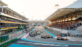 Fans watching from the grandstands as the F1 cars start the Abu Dhabi GP