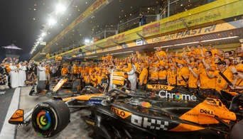 The McLaren team celebrates their constructors championship at the Abu Dhabi GP