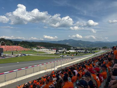 Formula 1 fans in the grandstands at the Red Bull Ring during the Austrian Grand Prix