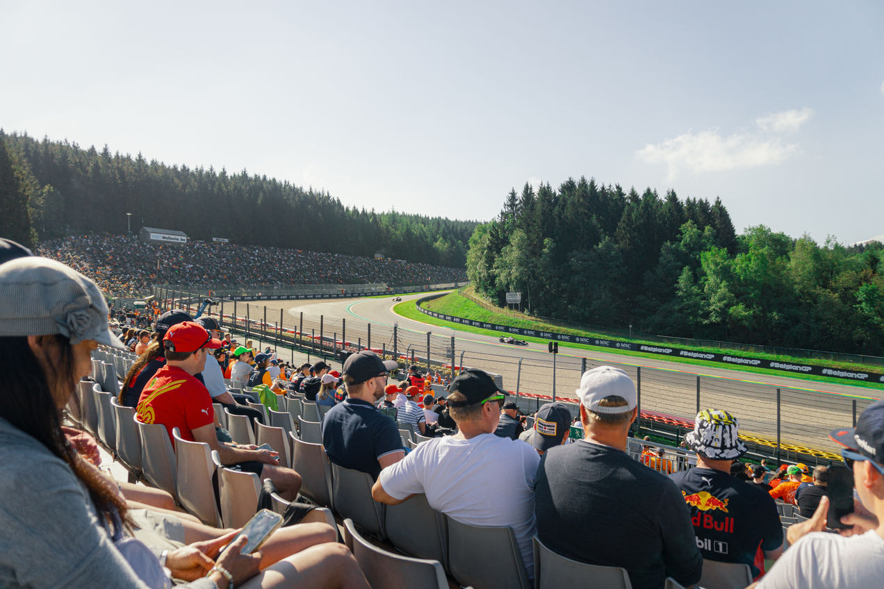 F1 cars driving past the Silver 3 Grandstand during the Belgian GP