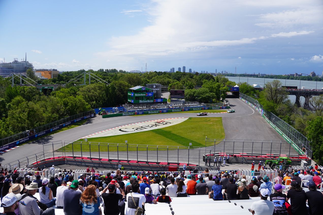 Fans on Grandstand T31 of Circuit Gilles Villeneuve with the skyline of Montréal in the background