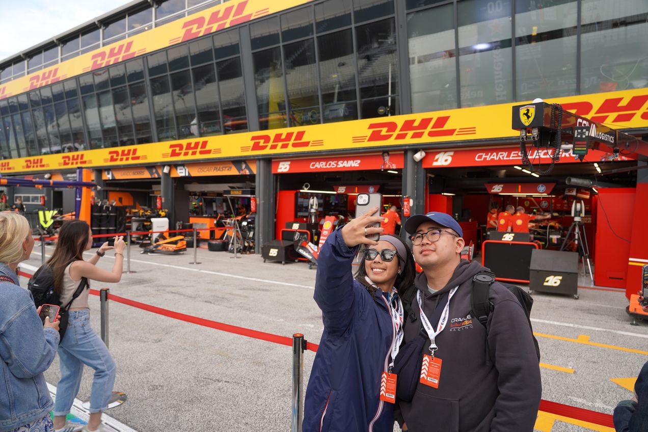 Fans during the Pit Lane Walk at Zandvoort taking a selfie with the Ferrari-paddocks