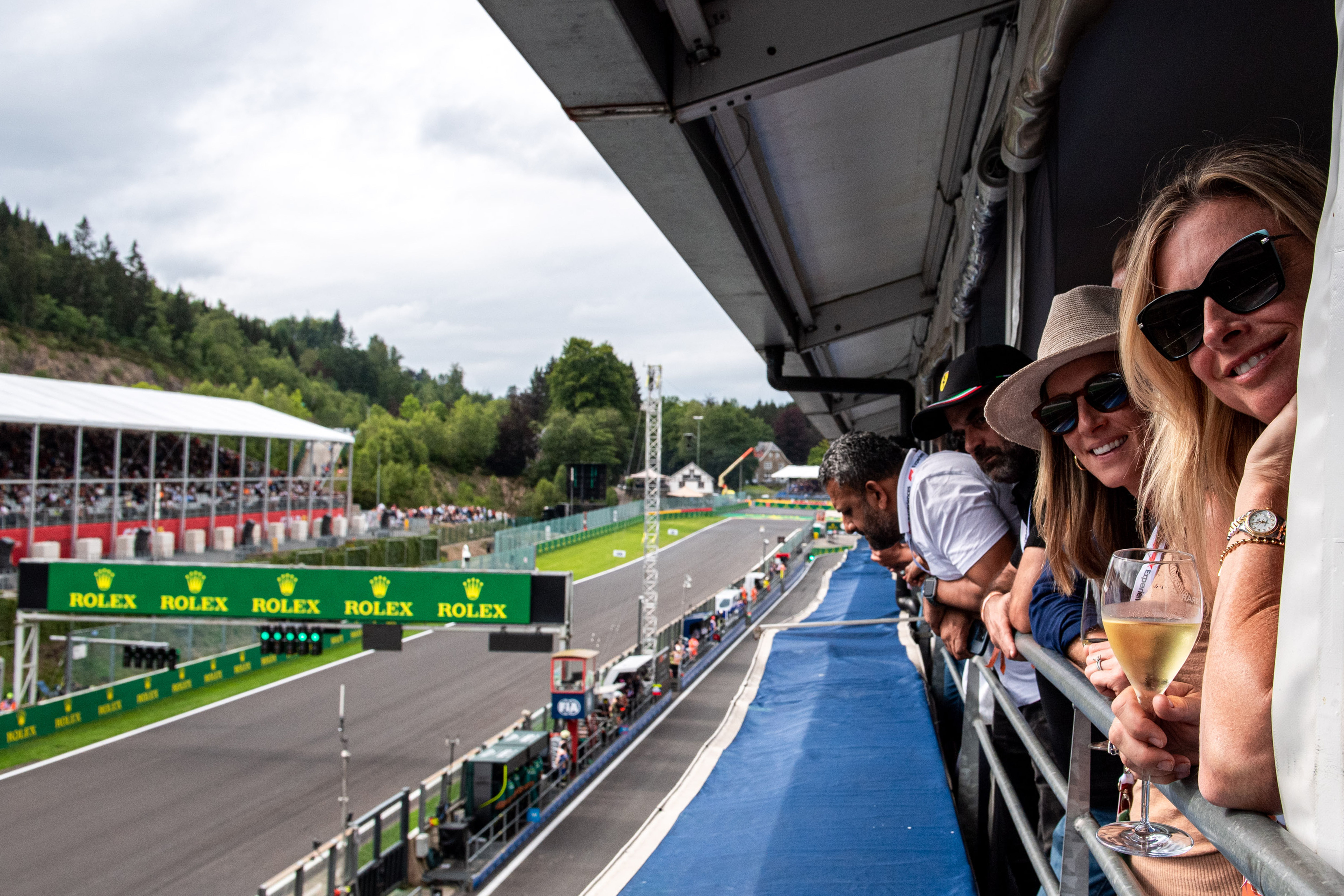 Paddock Club guests enjoying the view over the pit lane and the team garages during the Belgian GP