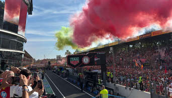 Fans on the main straight of Monza after the racing action of the day is done
