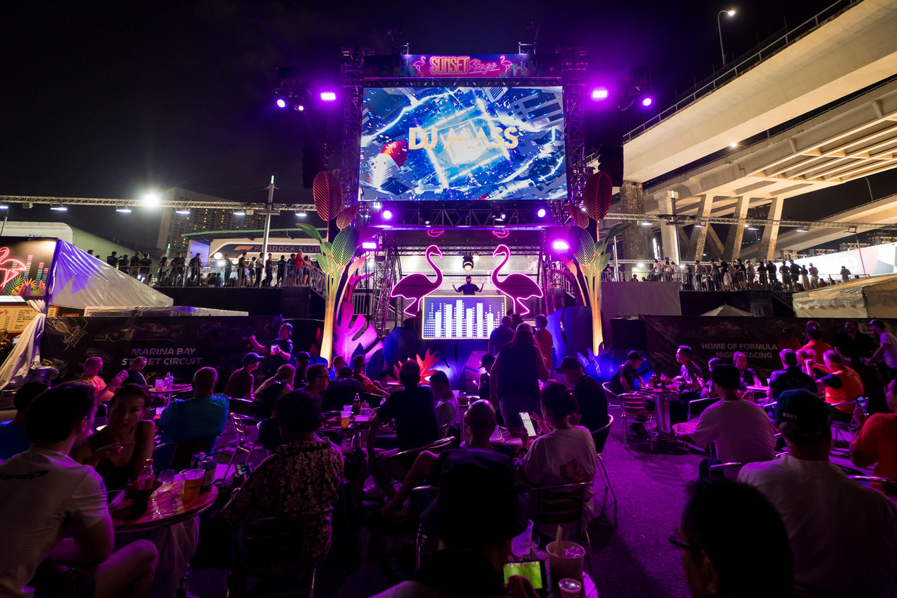 A DJ performing on the Sunset Stage at the Singapore GP