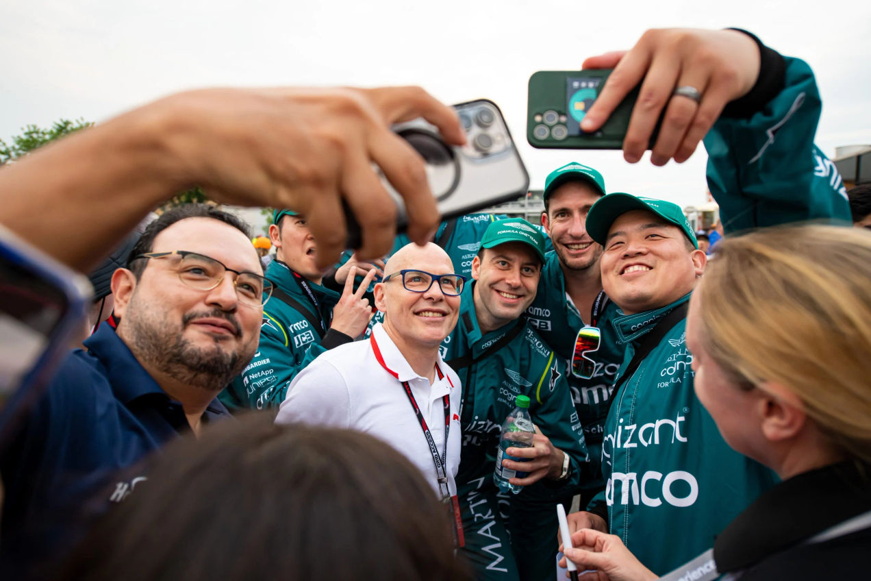 Formula One fans take selfies during a meet-and-greet