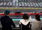 F1 fans watch the race from the Champions Club lounge at the Japanese GP