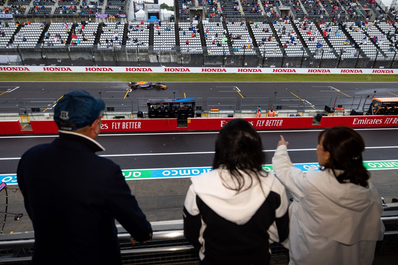 F1 fans watch the race from the Champions Club lounge at the Japanese GP