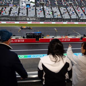 F1 fans watch the race from the Champions Club lounge at the Japanese GP