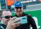F1 Experiences guest takes a selfie with Esteban Ocon during one of the special events