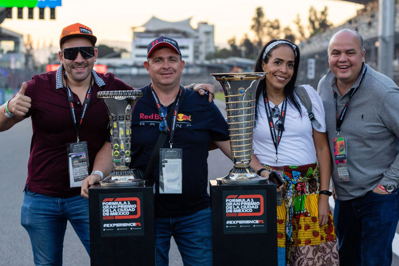 Guests taking their Championship Trophy photo at the Mexican GP