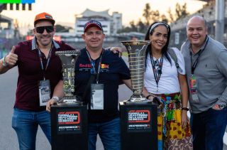 Guests taking their Championship Trophy photo at the Mexican GP