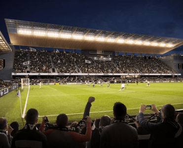 Craven Cottage during a Fulham match in the evening