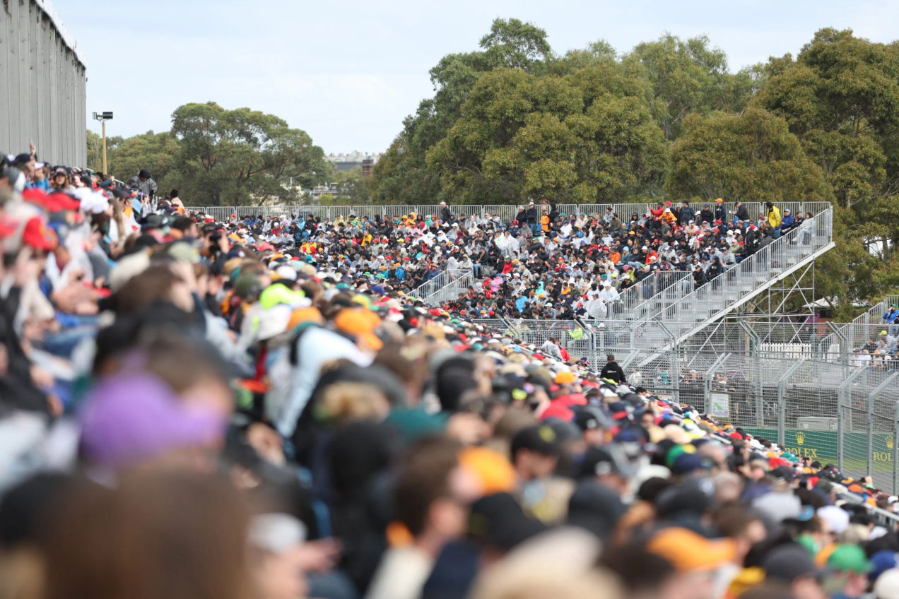 View of a crowded grandstand at the Australian GP