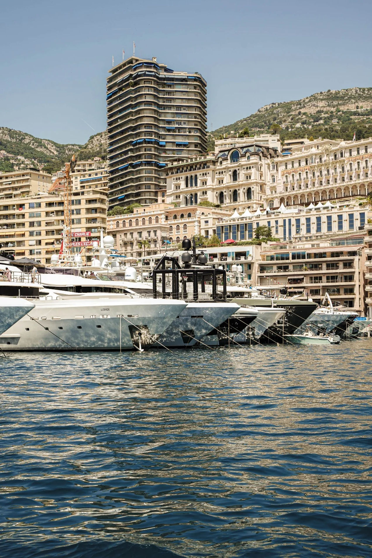 View from the water of private yachts in Monaco Harbour for the Monaco GP