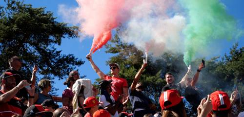 Green, white and red smoke on a grandstand of Monza