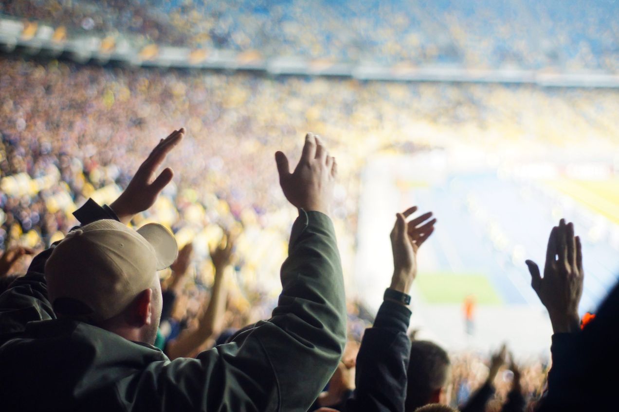 Football fans cheering