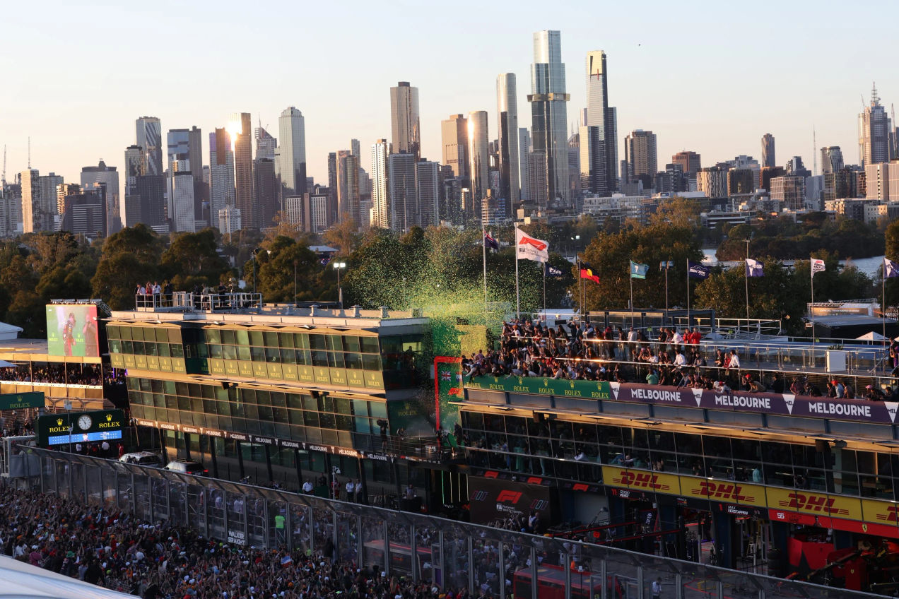F1 fans walk on the track at the Australian GP